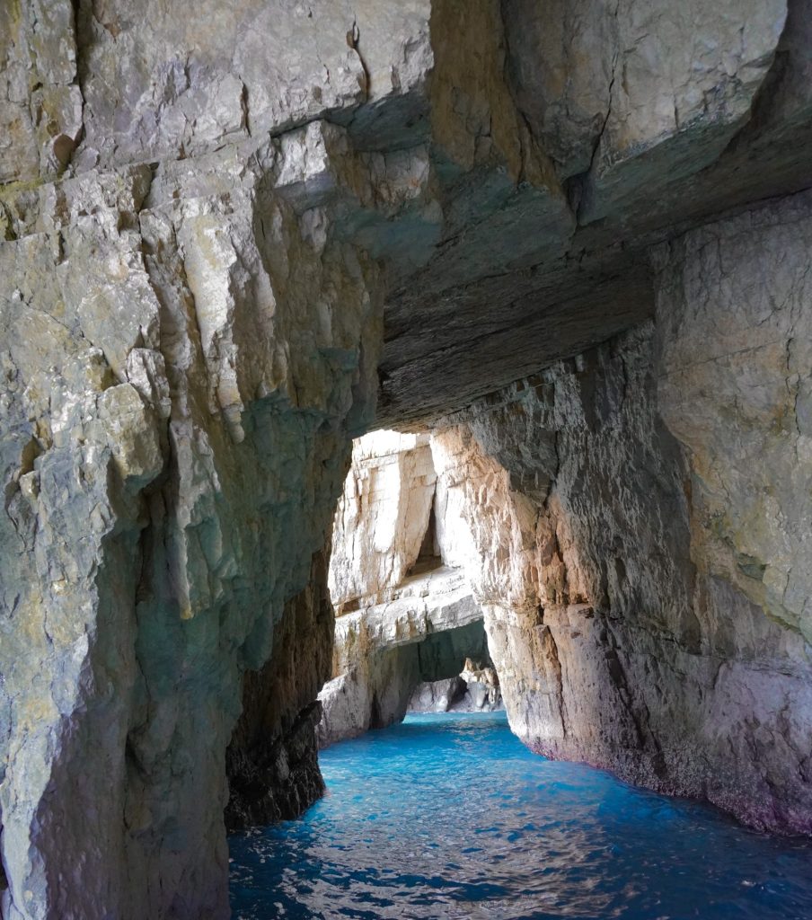 Natural sea cave with turquoise waters in the Blue Caves of Zakynthos