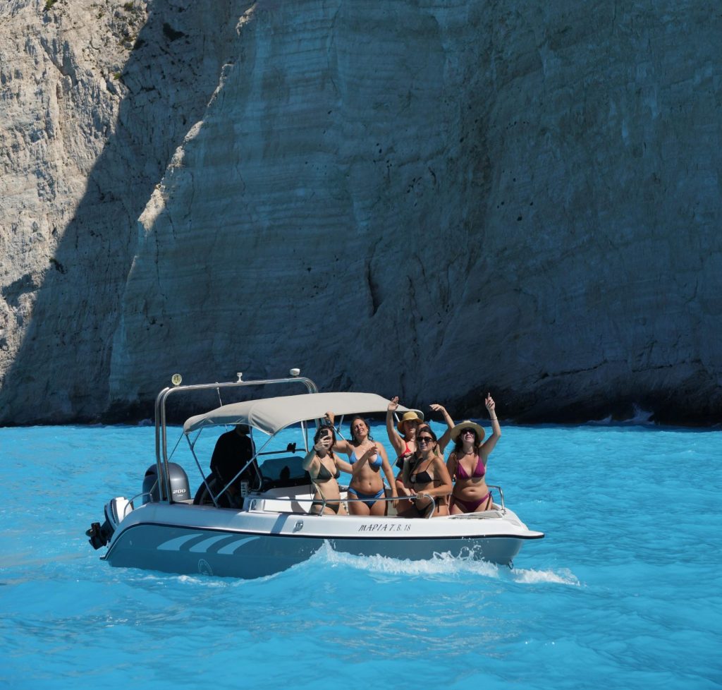 Group of guests enjoying a private boat cruise in Zakynthos